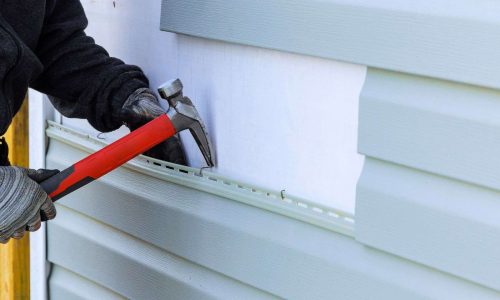 Here's What It Really Costs to Replace Siding on a Home